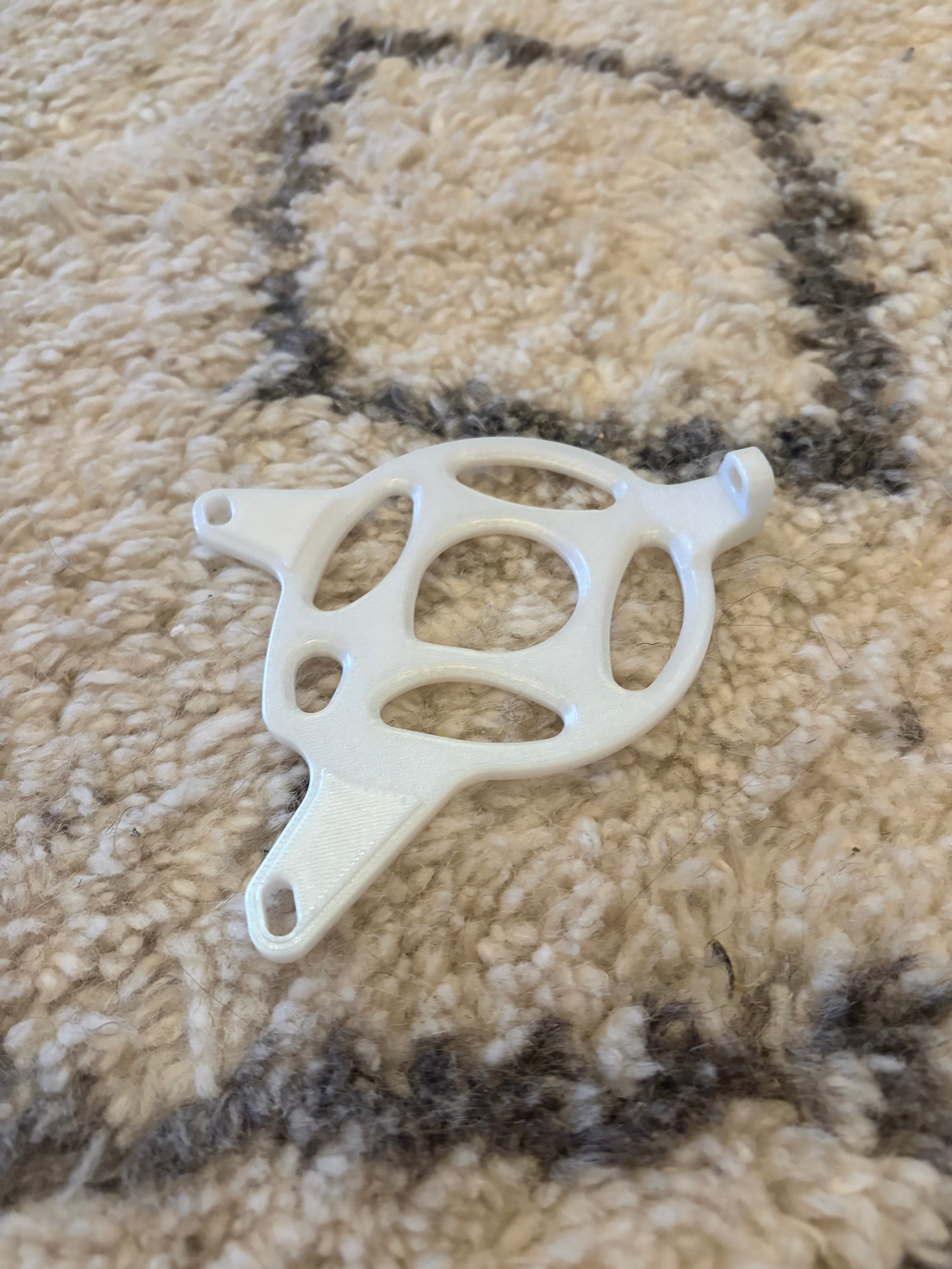 Tuttio motor cover